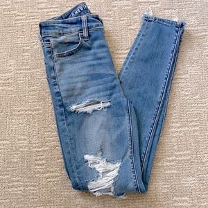 American Eagle Next Level Stretch Super Hi-Rise Jegging Distressed Med Wash